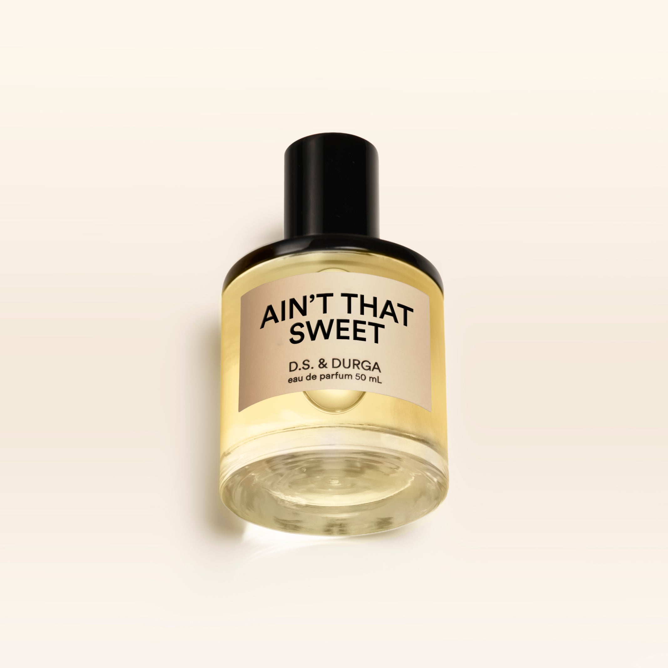 A 50 mL bottle of Ain't That Sweet perfume