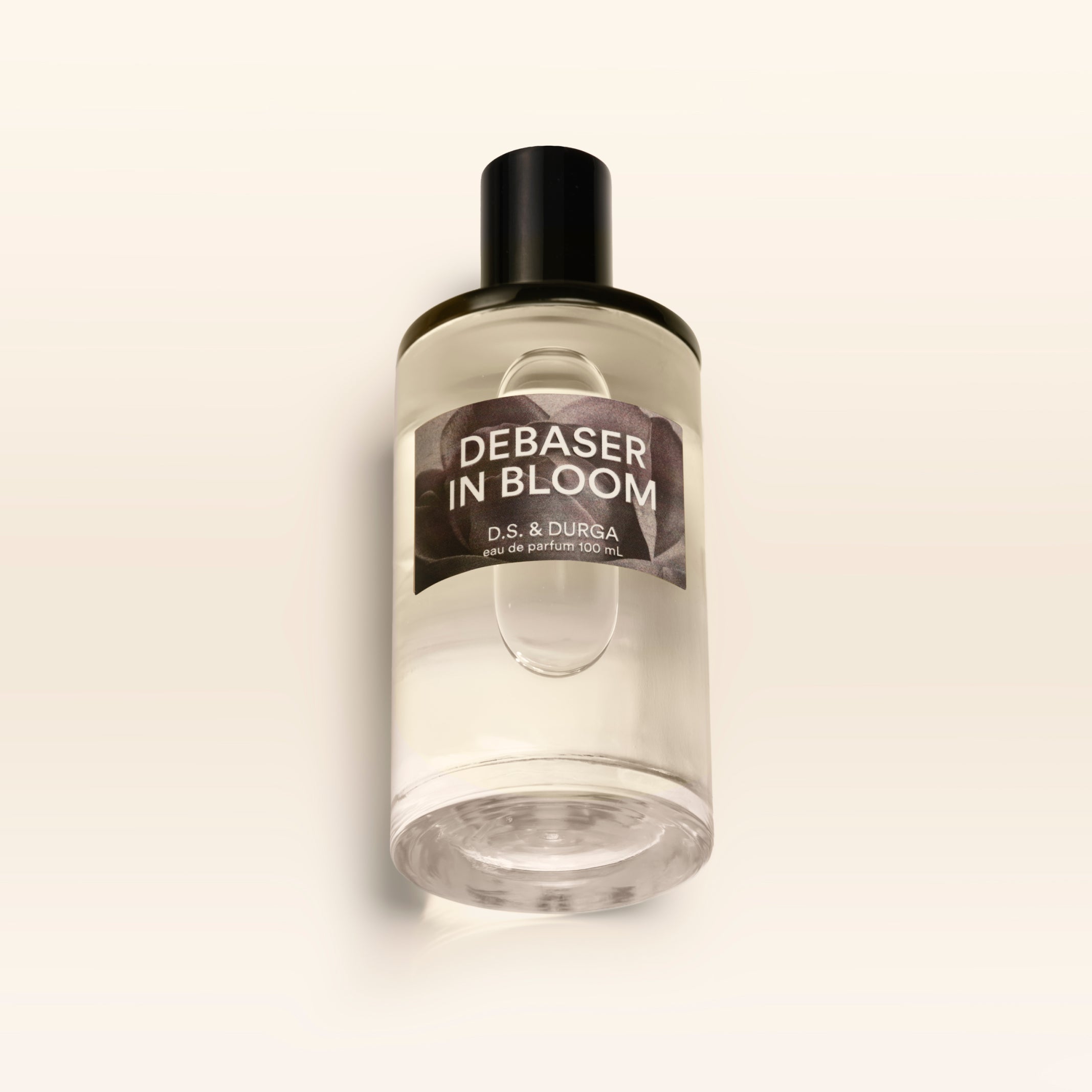 A 100 mL bottle of Debaser in Bloom perfume
