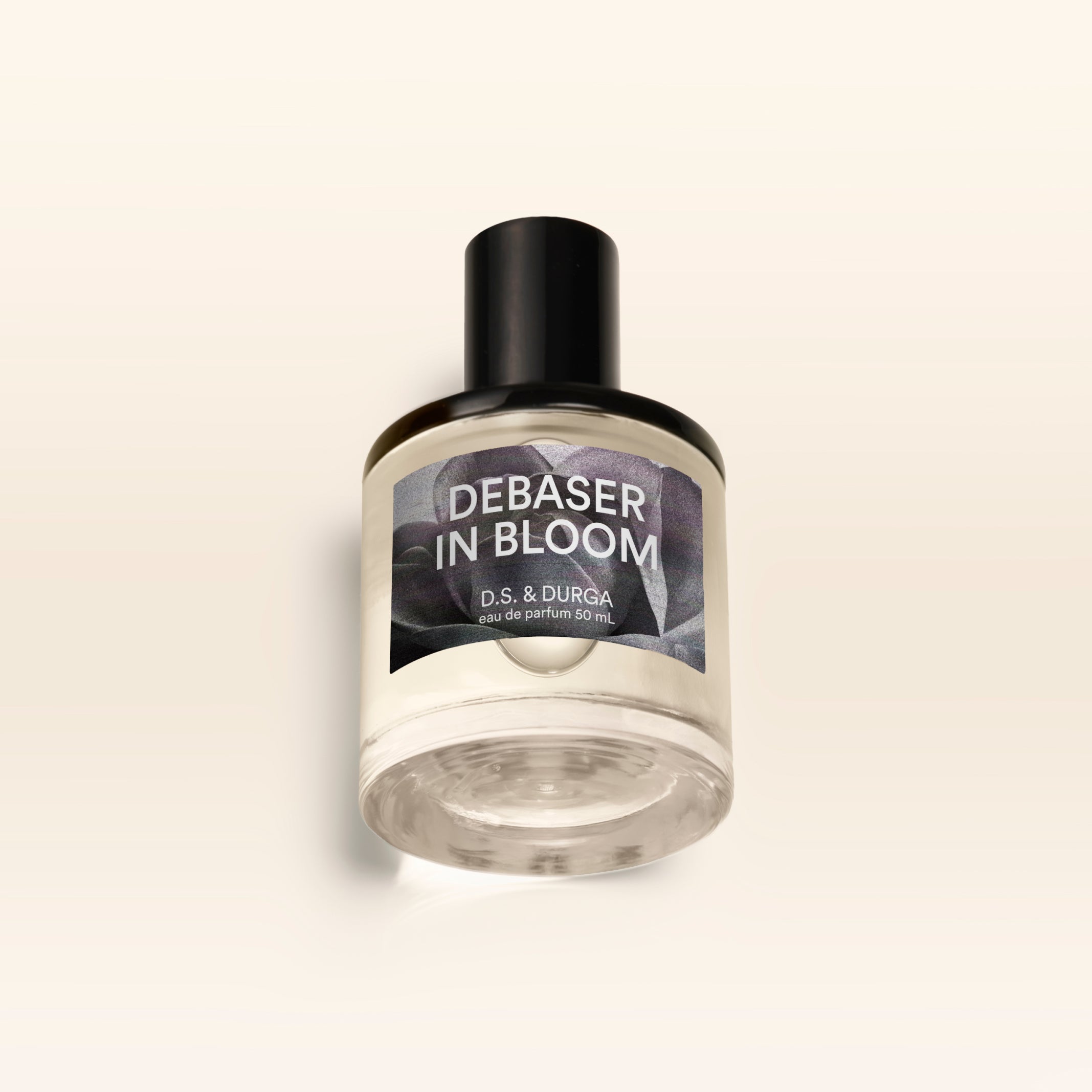 A 50 mL bottle of Debaser in Bloom perfume