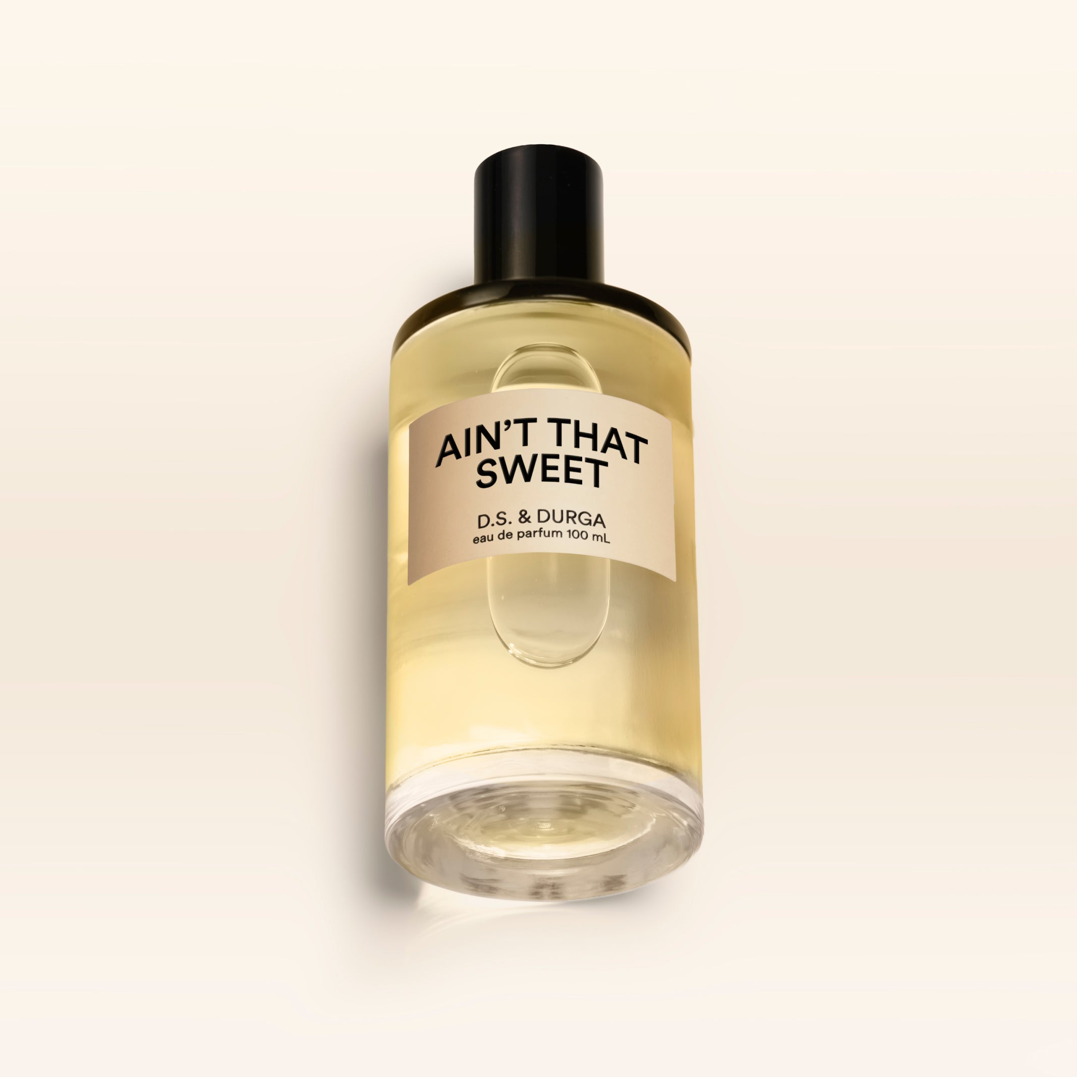 A 100 mL bottle of Ain't That Sweet perfume