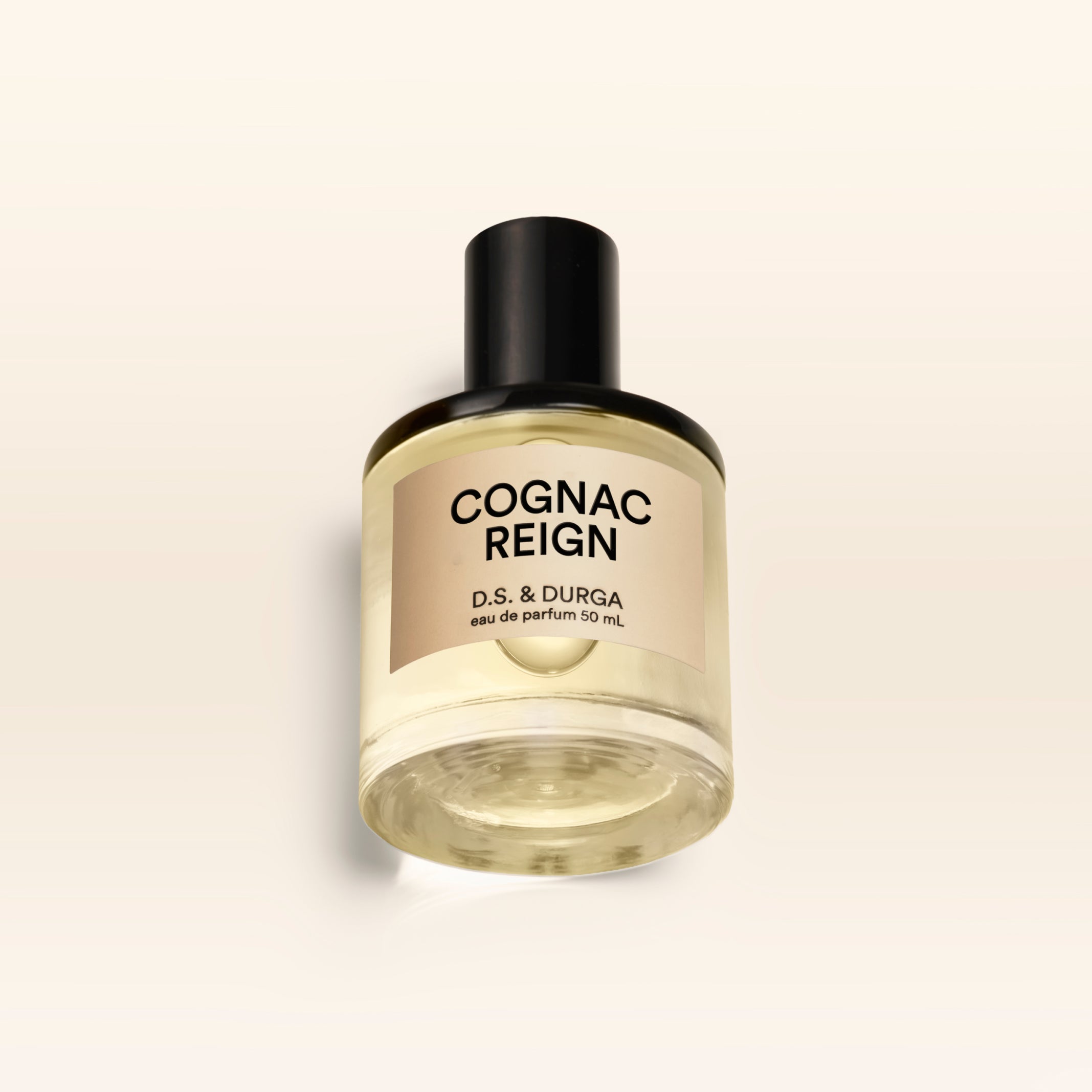A 50 mL bottle of Cognac Reign perfume.